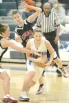 Palmer’s Shawna Thein takes control of the ball during the final
period of Saturday’s game against the Kenai Kardinals at Palmer
High School in a key Northern Lights Conference showdown. ROBE