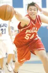 ROBERT DeBERRY/Frontiersman Wasilla freshman David Green reaches
for the loose ball during Saturday's game against the Palmer Moose
at Palmer High School. Wasilla earned wins over Palmer and 