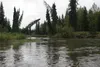Rain showers Sunday prompted the National Weather Service to issue a flood warning for part of the Mat-Su Valley. Rain showers are expected to continue through Thursday. HEATHER A. RESZ/Front