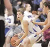Palmer junior guard Mikaela Bolling takes control of the ball
during Thursday's game against the Kenai Kardinals at the Northern
Lights Conference Championship Tournament. (ROBERT
DeBERRY/Fro