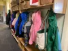 Children's coats hang in a hallway at Hillcrest Childcare Center in Anchorage o n April 18. The second and final report of a child care task force holds recommendations for expanding subsidie