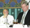 Rep. Carl Gatto, left, and former Rep. Vic Kohring listen as a chamber member poses a question to the delegates in July 2003. At that time, Gatto was a first-time delegate to the House of Rep