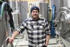 Jed Wade poses for a photo at Bearpaw River Brewing Company's Palmer-Wasilla Highway location. Jacob Mann/Frontiersman