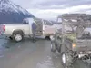 ANDREW WELLNER/Frontiersman Alaska State Trooper Investigator
Luis Nieves searches a truck while patrolling the Knik River Public
Use Area Friday evening.