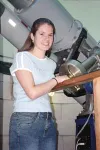 Submitted photo Teressa Van Diest stands next to the telescope
in the Mount Wilson Observatory in Ojai, Calif., where she
participated in a six-month science camp. She tracked an asteroid
and