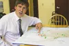 Colony High School math teacher Bob Williams points to a map of Alaska to indicate communities he’s visited during his 13 months running for lieutenant governor. Williams faces state Sen. Hol