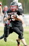 Houston junior Waylon Soptick runs for a gain during a win over Valdez. Soptick was recently  named first-team All-Northern Lights Conference. Soptick was one of six Houston players recognize