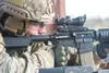 U.S. Air Force Capt. Nicholas Mello, an air liaison officer assigned to the 3rd Air Support Operations Squadron, sights in on a target while zeroing his M4 carbine during live-fire sustainmen