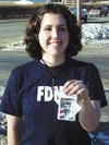 At right, Susannah Numme shows off her security badge, which was
required as part of her work near Ground Zero. Photo courtesy
Susannah Numme