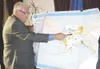 K.T. McKEE/Frontiersman Former Gov. Frank Murkowski discusses
various parts of Alaska and who controls different areas Monday
while urging Valley Republicans during a luncheon to help him in
