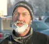 MICHAEL ROVITO/Frontiersman Todd Weaver of Palmer isn’t going
gray, his beard took on a frosty look after completing the running
leg of the Colony Christmas Triathlon on Sunday.