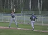 ROBERT DeBERRY/Frontiersman Alaska Road Warrior first baseman
Dusty Wisdom stretches to make a catch during Thursday tournament
opener against the Eagle River Wolves.