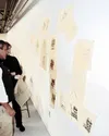 Douglas Duany, a landscape architect from Miami, and Rebekah
Sperbeck, a junior architect from Michigan, draw up sketches
describing possible uses for 7.5 acres of vacant space in Wasilla.
Ph