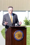 Gov. Mike Dunleavy, seen here during a press conference at Wasilla Middle School, announced his state budget vetoes June 28. Tim Rockey/Frontiersman///