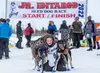 2022 Junior Iditarod champion Emily Robinson poses for a victory photo with her dogs. Courtesy photo provided by Whitney McLaren