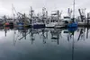 Fishing boats are lined up on Oct. 3, 2022, at a dock at Kodiak's St. Paul Harbor. Alaska's fishing industry is being battered by competition from vast quantities of Russian fish, inflation t