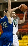 Colony’s Hunter Eisenhower shoots for two points during Colony’s win over Thunder Mountain during quarterfinal competition at the ASAA/First National 4A State Basketball Championships at the 