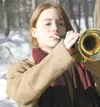 SHARON G. McBRIDE/Frontiersman Nichelle Cushing, 15, a student
at Palmer High School, is a self-taught bugler. Nichelle taught
herself to sound “Taps” so she could honor her great-grandfather
