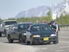 An Alaska State Trooper talks to a motorist after pulling her
over Friday evening along the Parks Highway. Troopers, along with
the Wasilla and Palmer police departments, were ramping up thei