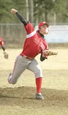 Wasilla senior Corey Cowgill fires a pitch in the first inning
of a 14-4 win over Palmer on Thursday at Wasilla High School.
Cowgill pitched a complete game to lead WHS to its first win of th