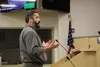 Ryan Zins, comptroller of Anchorage Sand and Gravel addresses the Mat-Su Borough Assembly during public comments at Tuesday's meeting. (Matt Hickman-Frontiersman)