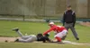 Wasilla infielder Ben Werner takes the throw to first as Colony junior Cooper Smith slides back into the bag during Wasilla's 15-5 win over the Knights in the Southcentral Conference Champion