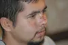 Tyler Hall talks with reporters after arriving in Anchorage on a
12-hour flight from Washington, D.C. Burns across his nose and
cheek serve as reminders of the initial explosion that hit he a