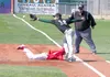 Colony first baseman Shane Andrews reaches for the throw as West Valley’s Jordan Rondenberger slides back into first during Colony’s 7-2 win over West Valley in the consolation semifinals of 