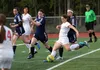 Wasilla's Alexis Friesen prepares to take a shot on goal during the Warriors' 3-0 girls prep soccer win over Homer on Friday, April 29, 2016 at Veterans Memorial Field in Wasilla. MATT TUNSET