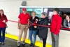 Wasilla Mayor Glenda Ledford cuts the ribbon for the new Donut King location. Wasilla Chamber of Commerce was also on hand to welcome the shop. Katie Stavick/Frontiersman