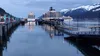 Three cruise ships are docked along Juneau's waterfront on the evening on May 10, 2023, as a Princess cruise ship on the right is departing the capital city. A "banner" year for tourism in 20