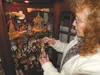 Kay Pierce holds a hand carving from Germany with the Christ Child on Joseph’s shoulders, holding the world in his hands.  Photos courtesy Barbara Adams