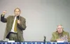 State Rep. Carl Gatto talks about a gas line as challenger Don Benson listens during a 2010 candidate forum at the Alaska Club Community Theater in Wasilla. ROBERT DeBERRY/Frontiersman