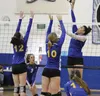 Palmer senior Leiah Reichel tips the ball over the Kodiak block during a 3-1 win over the Bears Nov. 7 in the semifinal round of the Northern Lights Conference Championships at Palmer High. J