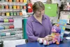 Mary Scheie, owner of Just Imagine Toys, prepares for what she
expects to be a busy holiday shopping season. (GREG
JOHNSON/Frontiersman)