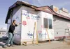 SCS Alaska owner John Stewart takes a measurement on the corner of Little Miller’s stand along Bogard Road Thursday afternoon. The popular coffee and ice cream stand is set to reopen Saturday