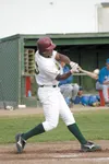 Former Mat-Su Miners standout Michael Taylor makes contact with the ball during the 2005 season. Taylor has been named to the Miners all-decade team. JEREMIAH BARTZ/Frontiersman