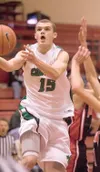 Colony sophomore guard Hunter Eisenhower drives to the basket
Wednesday against the Banning Pilots at the Doc larson Roundball
Classic at Wasilla High School. (ROBERT DeBERRY/Frontiersman)
