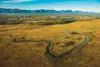 The Great Land Trust spent $1.5 million to buy 915 acres of land and add them to the Palmer Hay Flats State Game Refuge. The trust intends to raise money to build trails through the land, whi