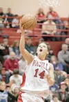 ROBERT DEBERRY/Frontiersman Wasilla senior forward Hillarie
Putnam drives to the bucket during a win over Palmer late in the
regular season. Putnam and the Warriors enter this week’s
large-sc