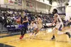 Susitna Valley's Cori Gossett drives the base line during a loss to Hooper Bay in the 2A girls state title game. Tim Rockey/Frontiersman