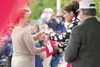 ROBERT DeBERRY/Frontiersman file photo Gov. Sarah Palin hands
out Blue Star Banners in recoginition of family members serving in
the military at the 2008 Governor’s Picnic in Wasilla. See pag