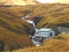 Photo courtesy Earle Ausman/Polarconsult Alaska, Inc. A
small-scale hydrological energy generator is a good option for
those looking to live off the grid.
