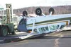 High winds flipped this plane at the Wasilla Airport Monday. A forklift was used to secure the plane until winds subside. HEATHER A. RESZ/Frontiersman.com