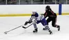 Palmer senior forward David Scully beats a Kenai defender prior to scoring a breakaway goal in overtime during a 5-4 win over the Kardinals Friday at the MTA Events Center in Palmer. Courtesy