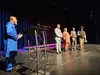 Mat-Su Martin Luther King Jr. Foundation board members Aundra Jackson, Melvin Sage-El, Simon Brown, and Cheryl Puryear sing 'Lift Every Voice and Sing' with Reverend Lee Grace. Jacob Mann/Fro