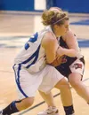 Palmer junior forward Kasara Brandenburg fights for the ball
during Friday's game against Kenai at Palmer High School. (ROBERT
DeBERRY/Frontiersman)