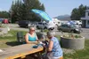 Recall Dunleavy volunteer Sheri Thomson talks to a bystander signing the petition to recall Gov. Mike Dunleavy from office. Jacob Mann/Frontiersman