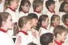 J.J. HARRIER/Frontiersman Members of the Alaska Children’s Choir
sing for students at Larson Elementary School in Wasilla as a
tune-up for a weekend holiday concert in Palmer. Half of the
cho