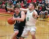 Soldotna's Eli Sheridan tries to get around Colony's Jon Pomrenke during Colony's 55-32 win over the Stars in the Northern Lights Conferene boys semifinals Friday, March 9, 2018, at Wasilla H